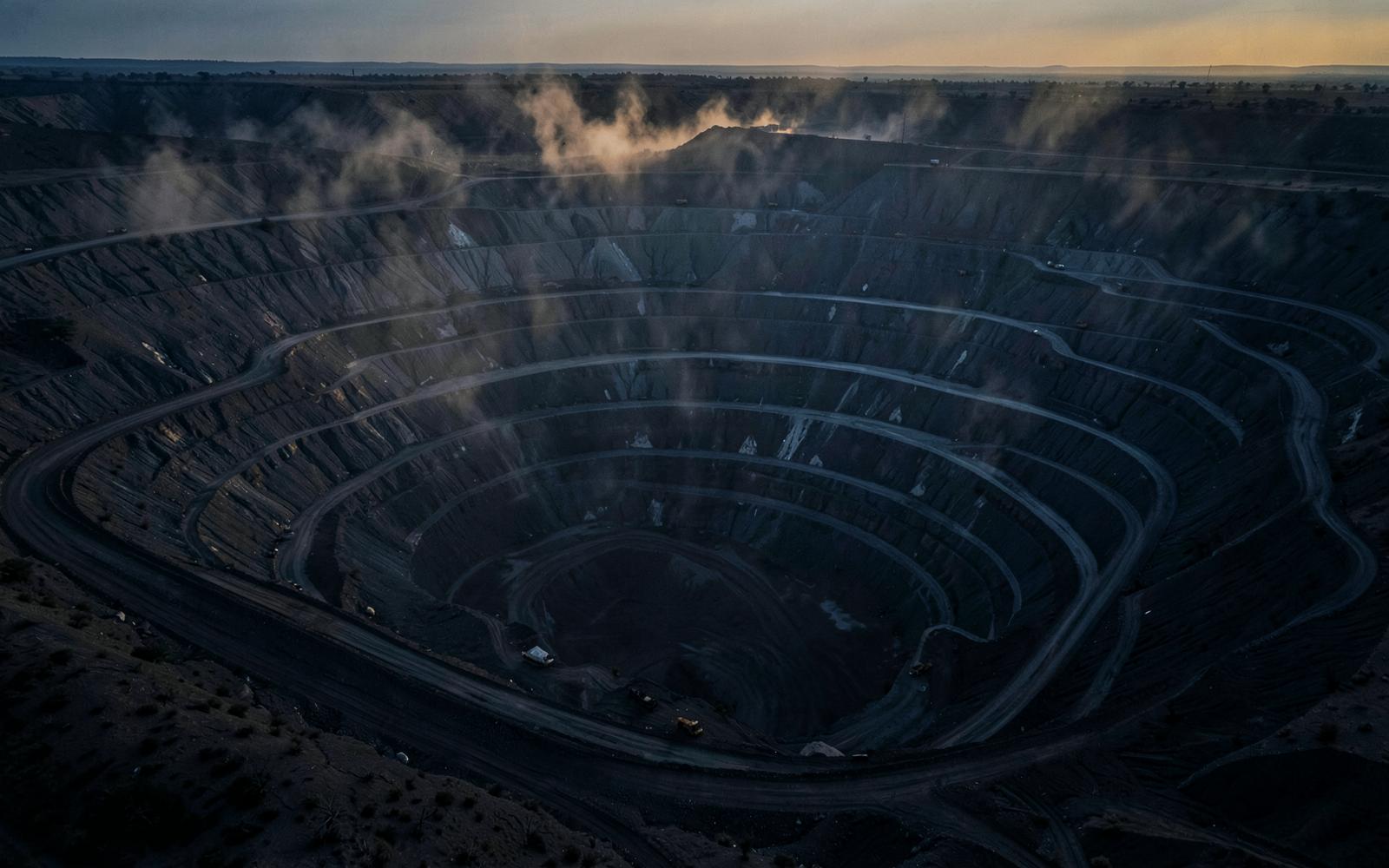 Terraced open-pit mine at dusk in Southern Africa